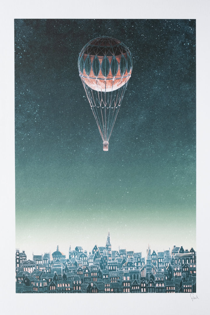 a deep forest green coloured print with an architectural style illustration of a city lit up for the evening with a lone ornate hot air balloon gently rising over the houses