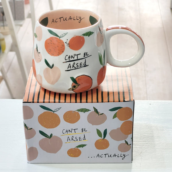 ceramic mug deocrated with fruit and saying I can't be arsed actually 