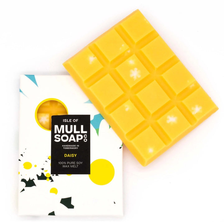 Yellow wax melt block with Isle of Mull Soap Co packaging on a white background