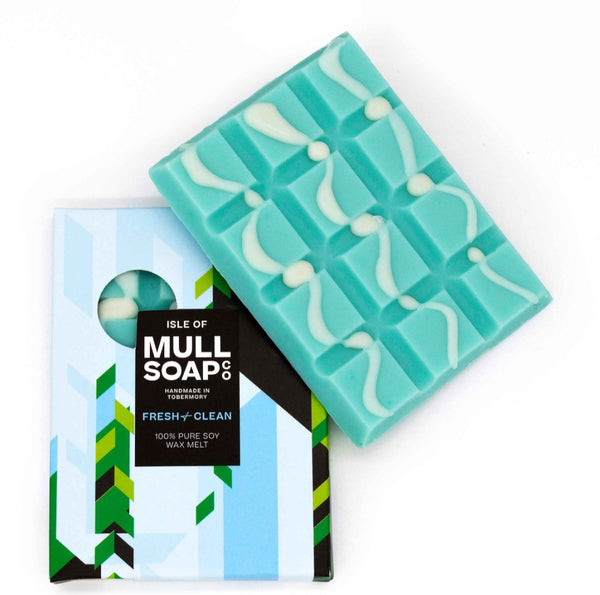 Teal wax melt block with packaging labeled 'Isle of Mull Soap Co' on a white background