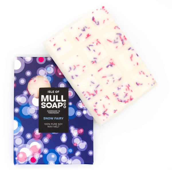 Snow fairy wax melt bar with packaging featuring colorful bubbles on a white background